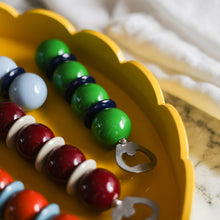Load image into Gallery viewer, Cherry and Cappuccino Bobbin Bottle Opener