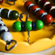 Load image into Gallery viewer, Khaki Green &amp; Pale Denim Bobbin Bottle Opener
