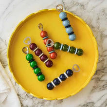 Load image into Gallery viewer, Khaki Green &amp; Pale Denim Bobbin Bottle Opener
